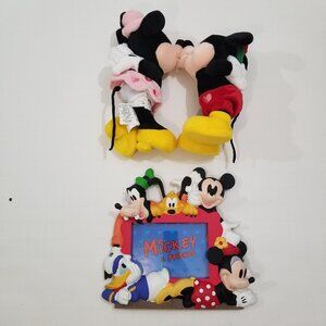 Mickey and Minnie kissing stuffed animals; Mickey and Friends picture frame